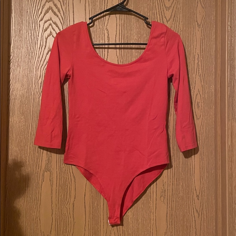 🌟Charlotte Russe orange bodysuit, size M